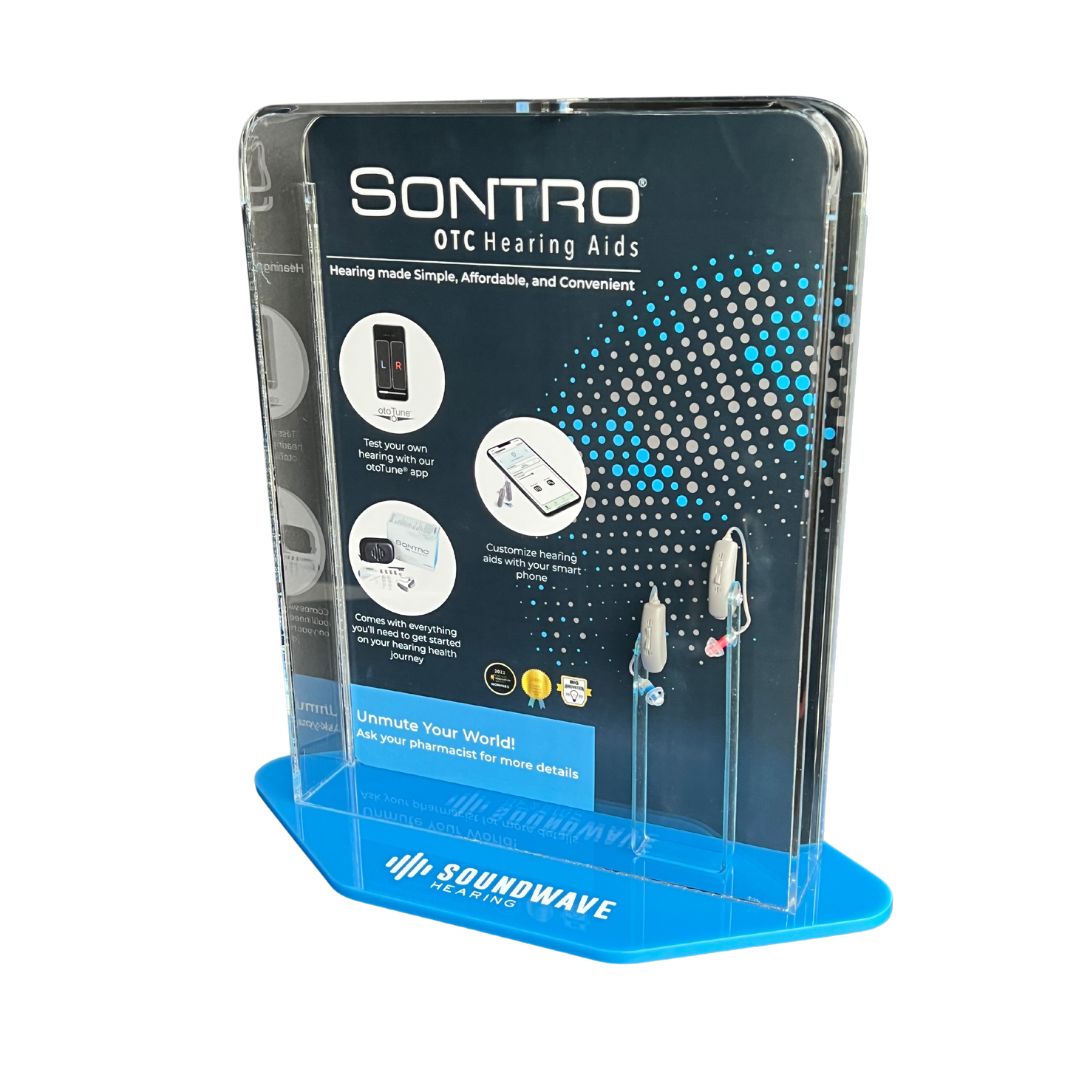 An acrylic box containing Sontro Self-Fitting OTC Hearing Aids and pictures of the otoTune App for In store Sales Promotion