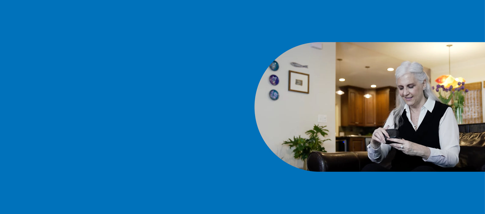 Woman opening new Sontros on sofa