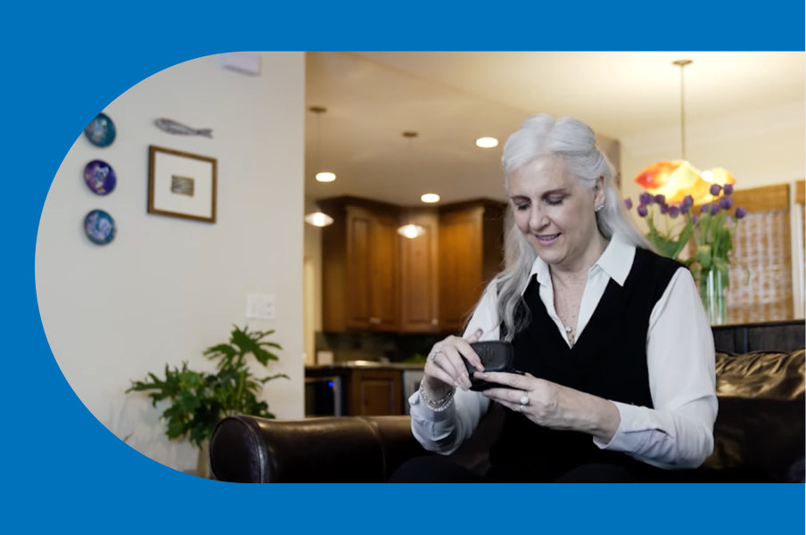 Woman opening new Sontros on sofa